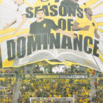 Hell Is Real Tifo Displaying Former Players With the Words "7 Seasons Of Dominance"
